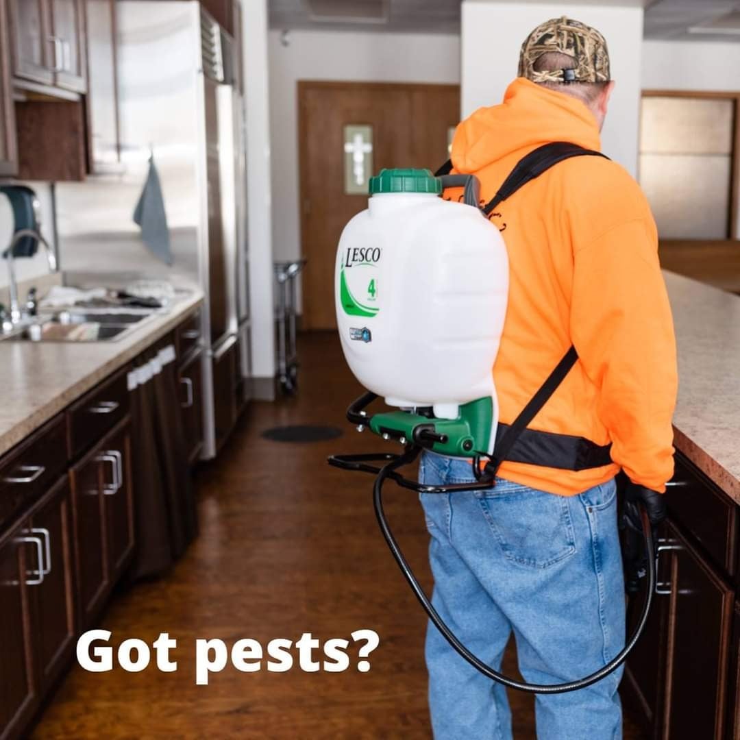 Critters Inc. technician providing pest service indoors